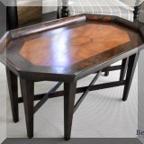 F11. New Classics Colorado eight-sided coffee table. 19”h x 40”w x 24”d 
